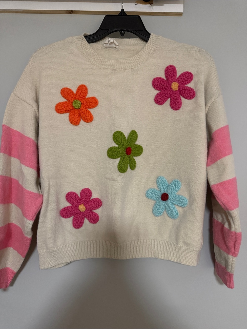 BiBi Cream Sweater with Colorful Crochet Flowers and Pink Stripe Sleeves